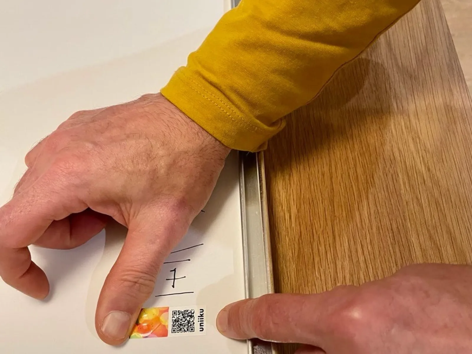 Uniiku security seal applied on the reverse of an artwork